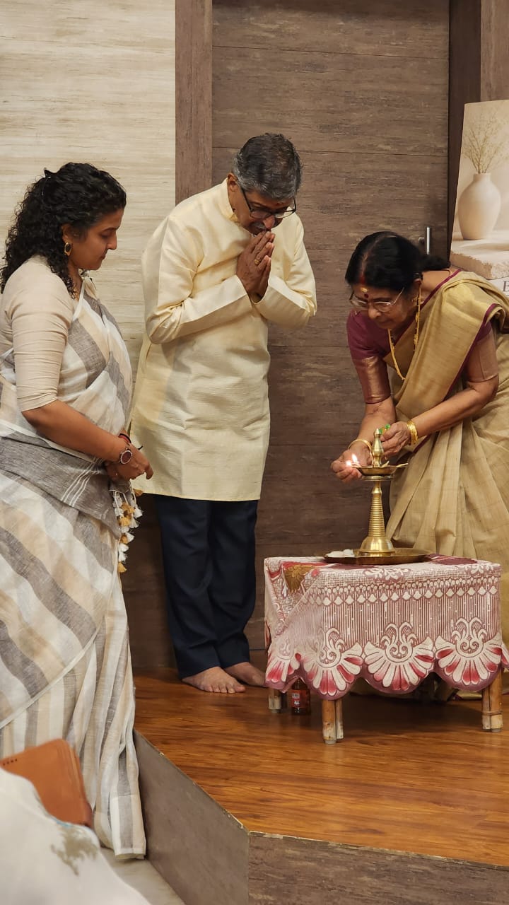 Lighting the traditional lamp to open the event