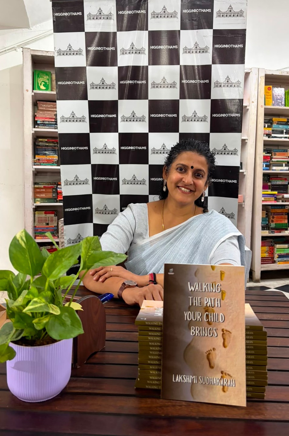 Lakshmi Sudhakaran with copies of Walking the Path Your Child Brings